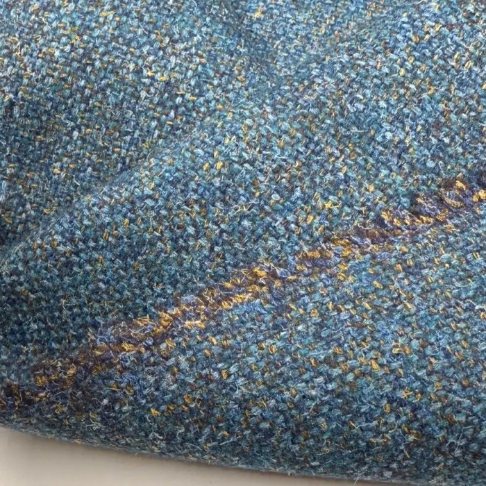 Tissu Laine acrylique bleu canard chiné moucheté doré