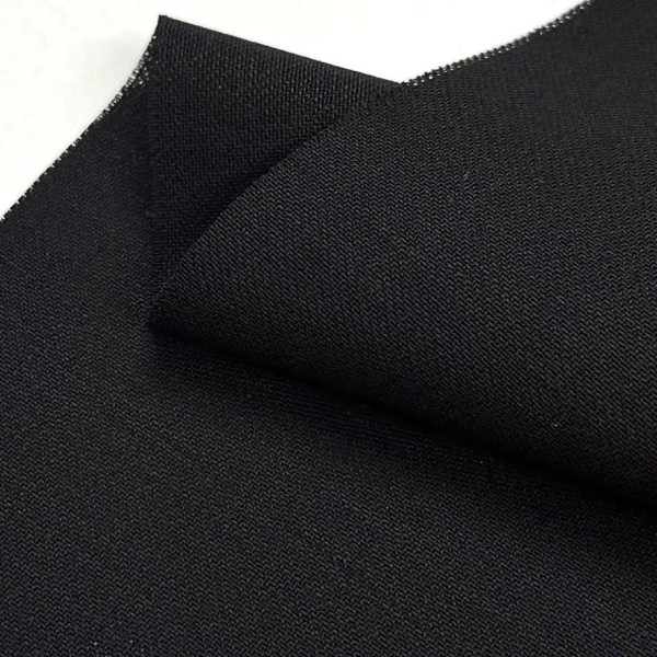 Tissu laine sèche uni noir souple Tissu laine sèche uni noir souple