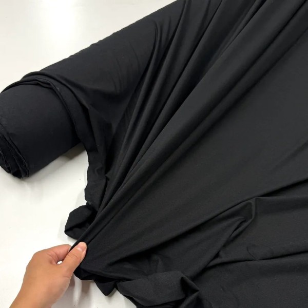Tissu jersey viscose élasthanne uni noir Tissu jersey viscose élasthanne uni noir