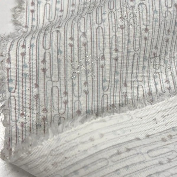 Tissu viscose coton imprimé flèches et étoiles argentées Tissu viscose coton imprimé flèches et étoiles argentées