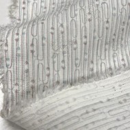 Tissu viscose coton imprimé flèches et étoiles argentées