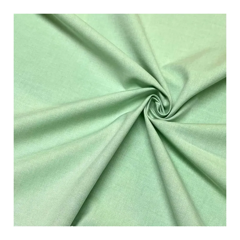 Tissu coton chambray vert uni - Haute couture