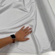 Tissu popeline coton blanc à fines rayures violet