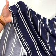 Tissu viscose rayé blanc sur fond bleu marine foncé