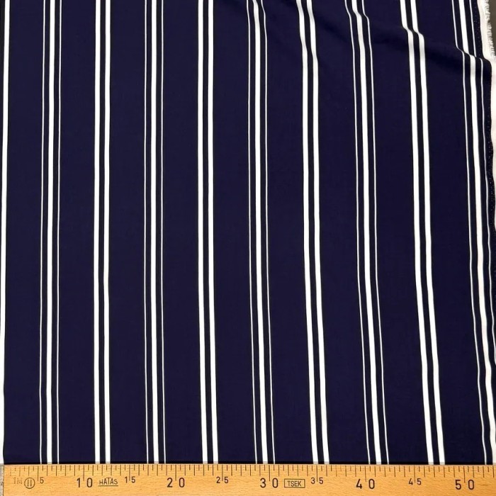 Tissu viscose rayé blanc sur fond bleu marine foncé