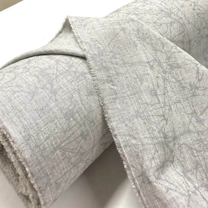 Tissu polyester texturé marbré gris clair