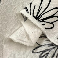 Tissu coton fibres mélangées fleurs noir sur blanc cassé