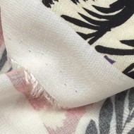 Tissu viscose tropical palmiers fuchsia et violet sur fond noir