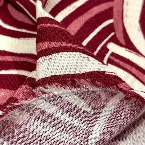 Tissu coton viscose tourbillon rouge rose blanc Tissu coton viscose tourbillon rouge rose blanc
