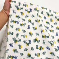 Tissu coton élasthanne tigres et feuillage sur fond blanc