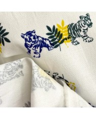Tissu coton élasthanne tigres et feuillage sur fond blanc