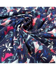 Tissu viscose fleurs d’ipomée multicolores sur bleu nuit