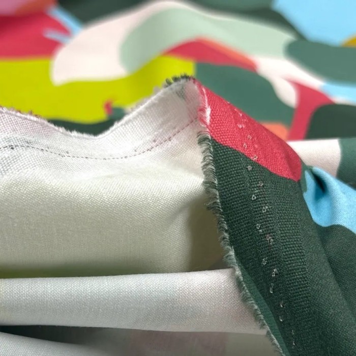 Tissu coton élasthanne Visages multicolores