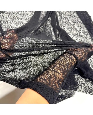 Tissu dentelle polyester élasthanne feuillage noir Haute Couture