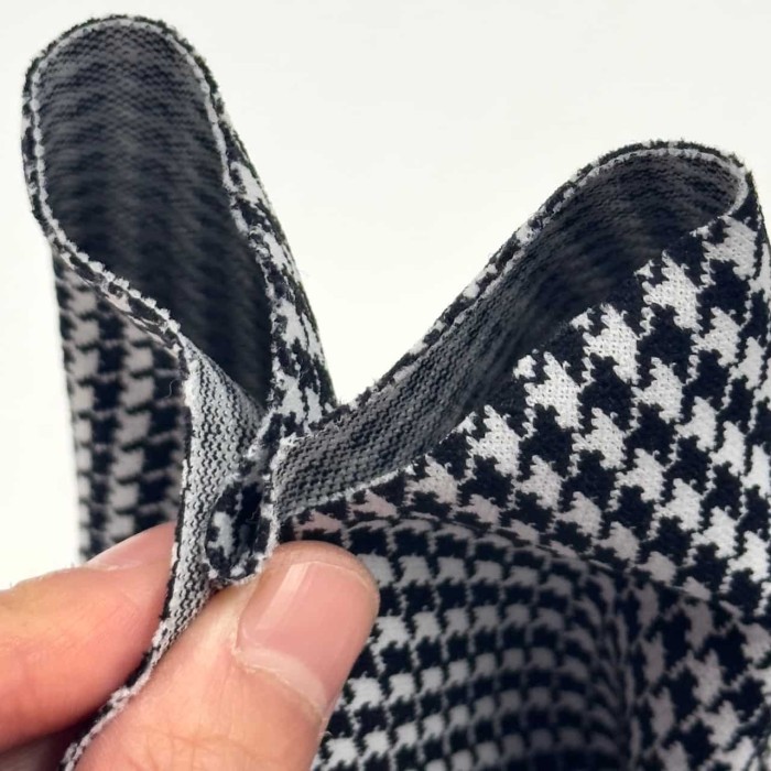 Tissu polyester jersey extensible pied de poule blanc et noir