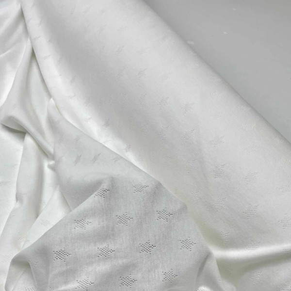 Tissu jersey coton brodé étoile blanc - Marque française Tissu jersey coton brodé étoile blanc - Marque française