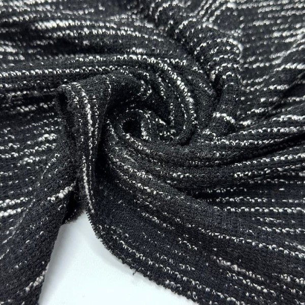 Tissu maille coton polyester chiné effet bouclé noir et blanc Tissu maille coton polyester chiné effet bouclé noir et blanc