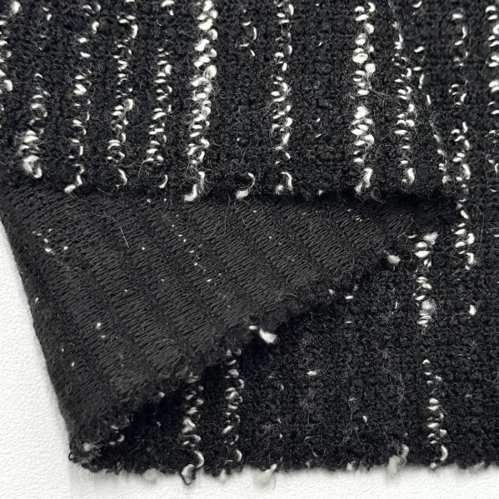Tissu maille coton polyester chiné effet bouclé noir et blanc