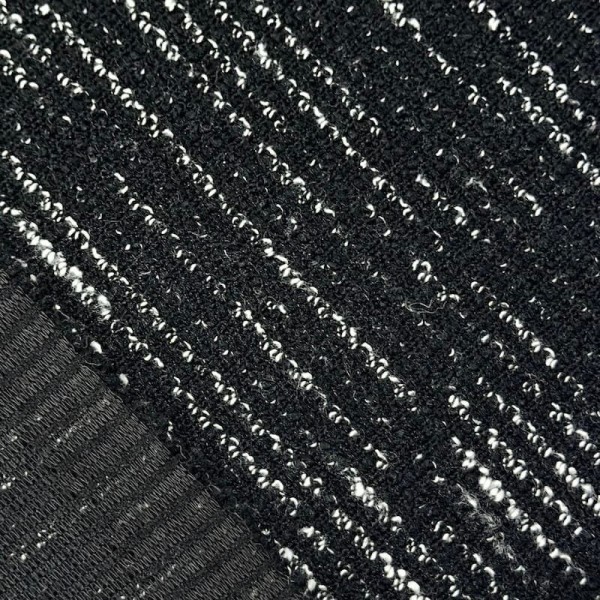Tissu maille coton polyester chiné effet bouclé noir et blanc Tissu maille coton polyester chiné effet bouclé noir et blanc