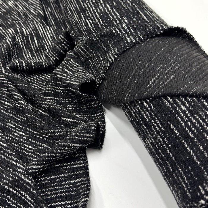Tissu maille coton polyester chiné effet bouclé noir et blanc