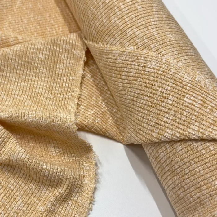Tissu maille côtelé polyester coton moucheté jaune clair