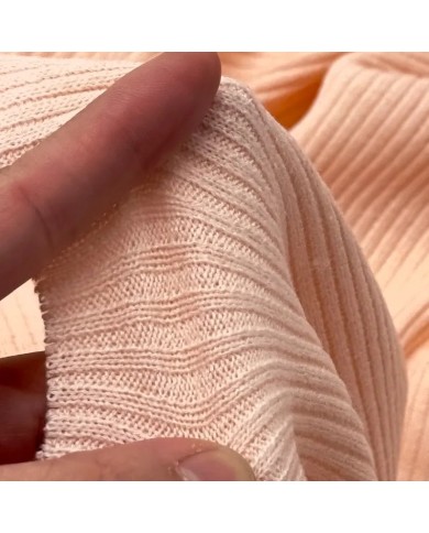 Tissu maille côtelé polyester élasthanne rose pâle
