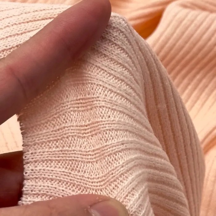 Tissu maille côtelé polyester élasthanne rose pâle