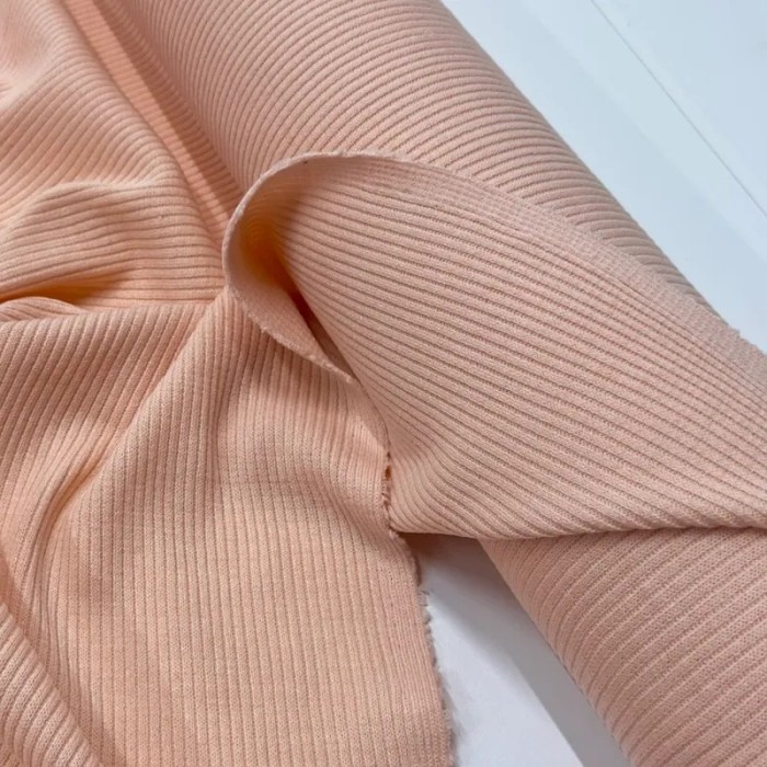 Tissu maille côtelé polyester élasthanne rose pâle