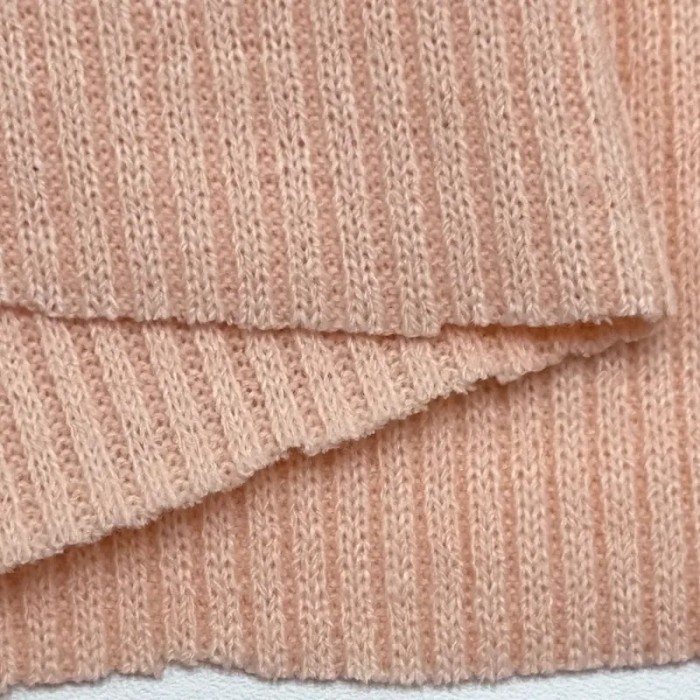 Tissu maille côtelé polyester élasthanne rose pâle