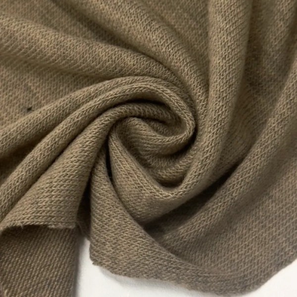 Tissu maille jersey polyester polyacrylique uni taupe Tissu maille jersey polyester polyacrylique uni taupe