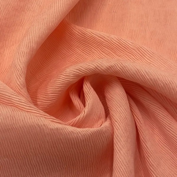 Tissu viscose nylon plissé fin saumon Tissu viscose nylon plissé fin saumon