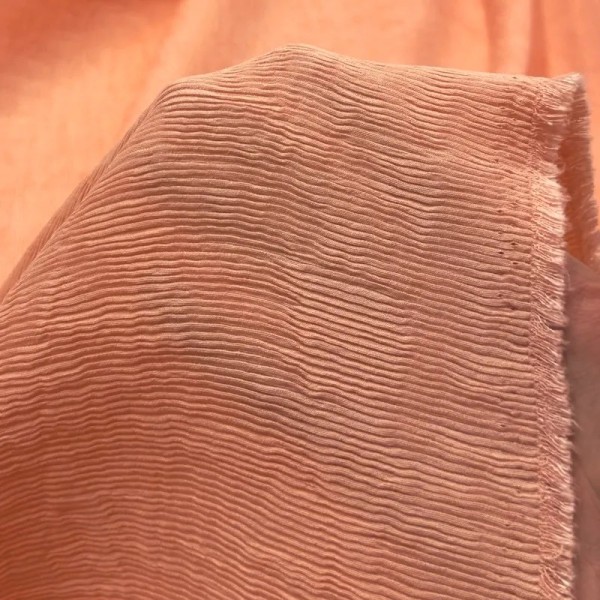 Tissu viscose nylon plissé fin saumon Tissu viscose nylon plissé fin saumon
