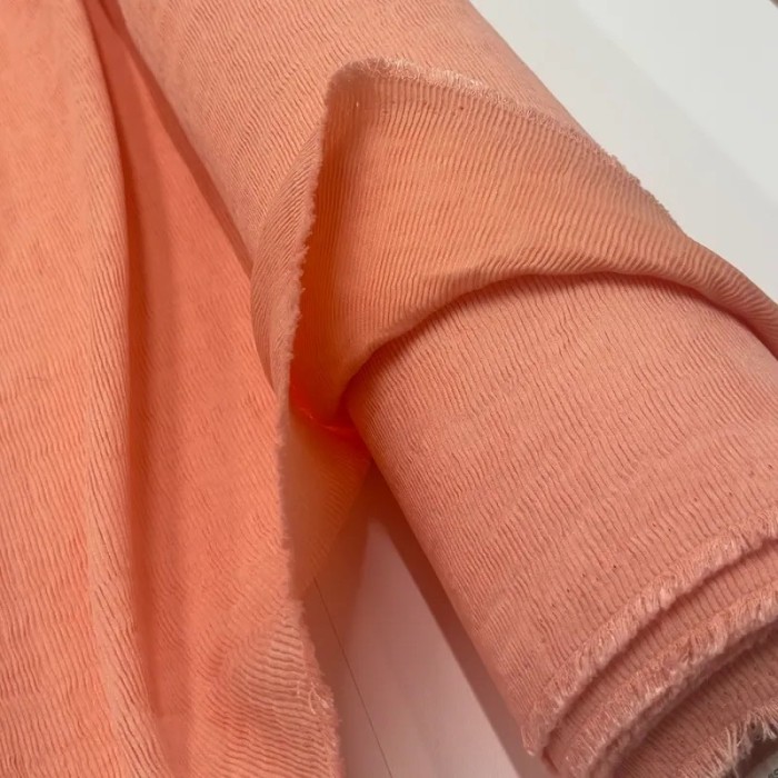 Tissu viscose nylon plissé fin saumon