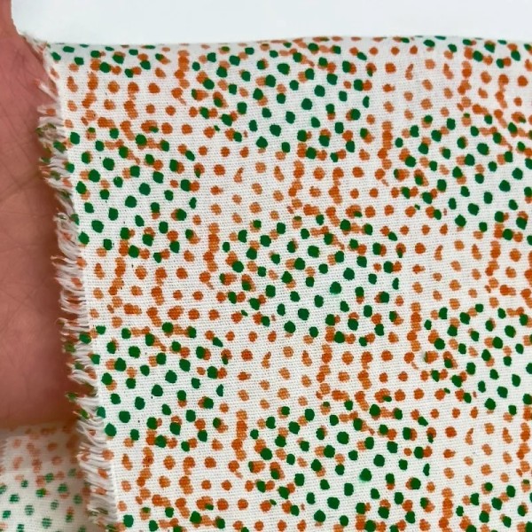 Tissu coton à petits pois colorés orange et vert Tissu coton à petits pois colorés orange et vert