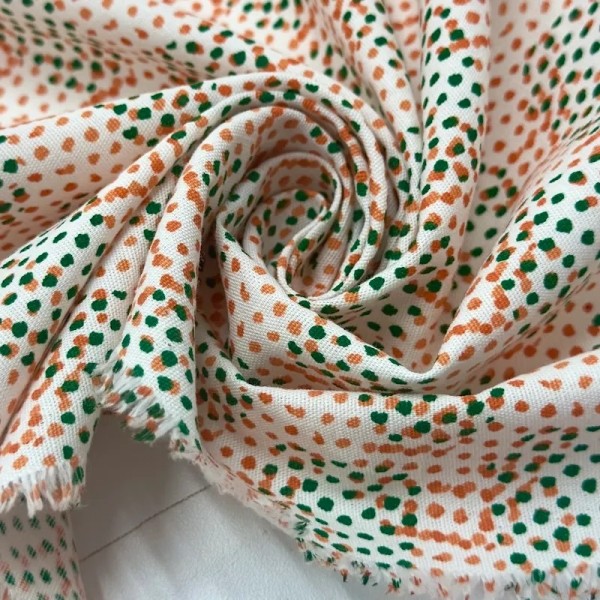 Tissu coton à petits pois colorés orange et vert Tissu coton à petits pois colorés orange et vert