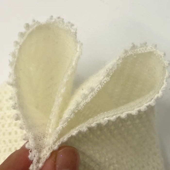 Tissu maille polyester polyacrylique uni ivoire