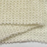 Tissu maille polyester polyacrylique uni ivoire