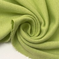 Tissu jersey polyester élasthanne uni vert pomme