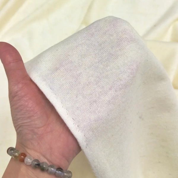 Tissu maille laine polyester uni écru Tissu maille laine polyester uni écru