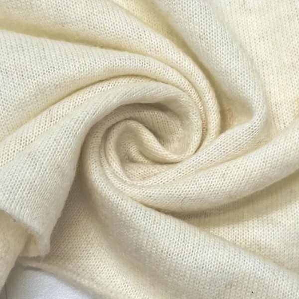 Tissu maille laine polyester uni écru Tissu maille laine polyester uni écru