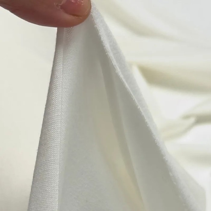 Tissu jersey viscose fin uni blanc cassé