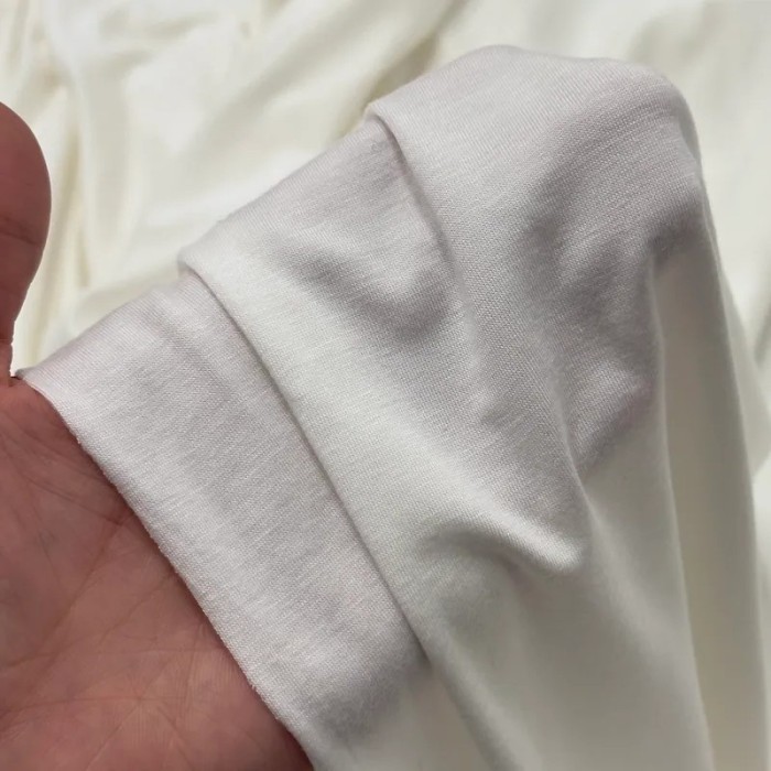 Tissu jersey viscose fin uni blanc cassé