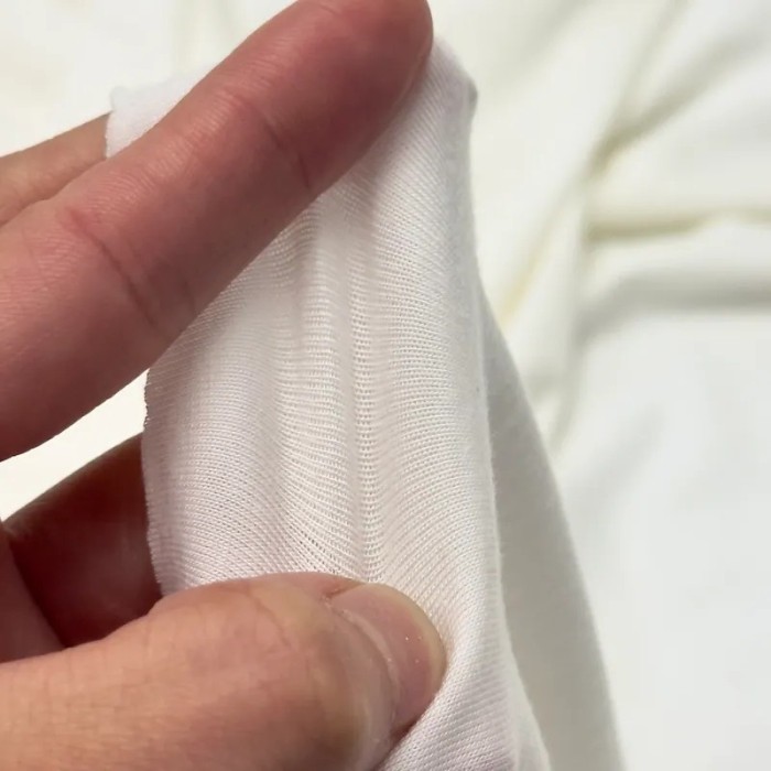 Tissu jersey viscose fin uni blanc cassé