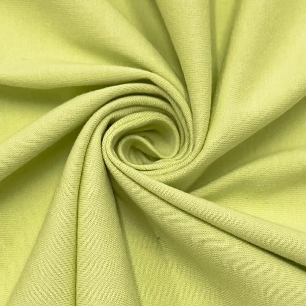 Tissu coton jersey uni vert clair Tissu coton jersey uni vert clair