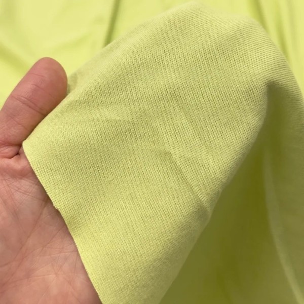 Tissu coton jersey uni vert clair Tissu coton jersey uni vert clair