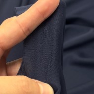 Tissu jersey polyester uni bleu marine foncé
