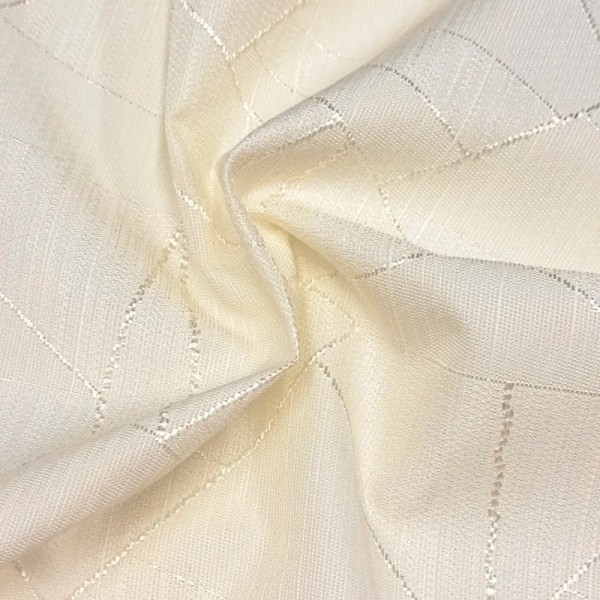 Tissu damassé pour nappe polyester crème – Déperlant Tissu damassé pour nappe polyester crème – Déperlant