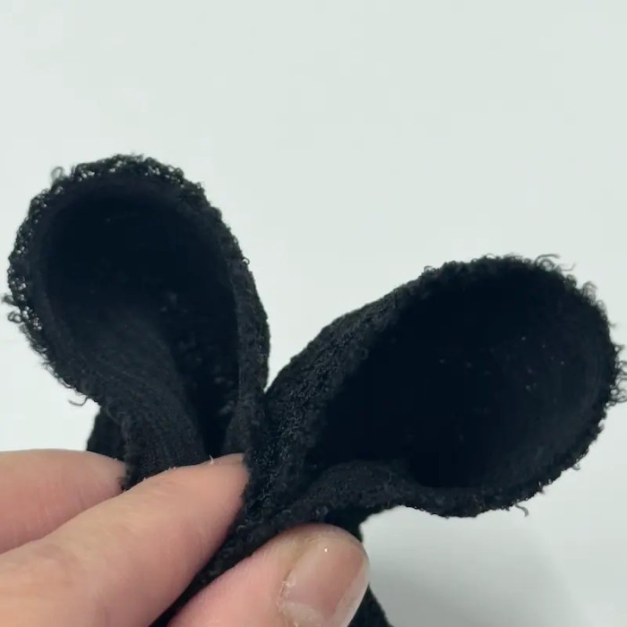 Tissu maille jacquard polyester élasthanne texturé géométrique noir