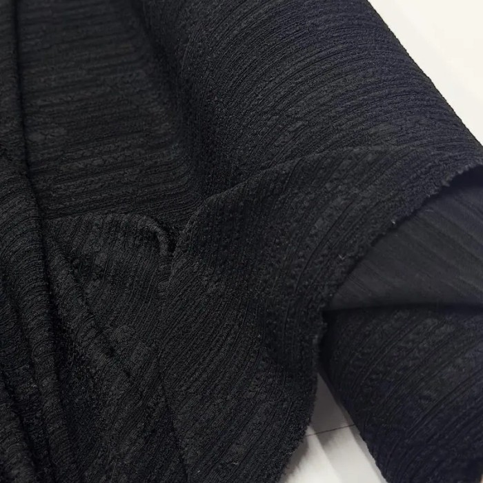 Tissu maille jacquard polyester élasthanne texturé géométrique noir