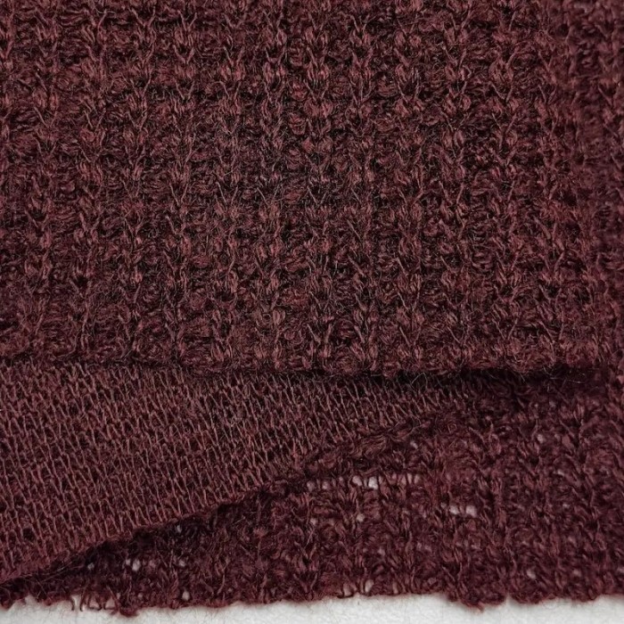Tissu maille nid d'abeille polyester effet tricot uni bordeaux Tissu maille nid d'abeille polyester effet tricot uni bordeaux